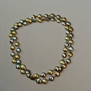 Silver and gold colored necklace